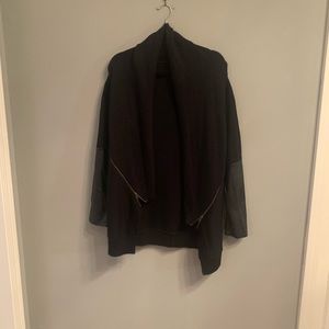 Black knitted open sweater with zippers and faux leather